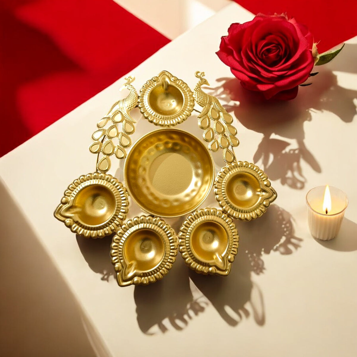 Gold Metal Decorative Diya Thali Set with 5 tealight holders and a center plate with a peacock design for home decor